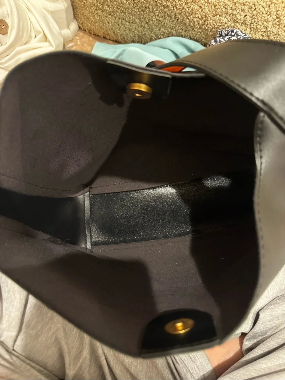 Elegant Black Leather Shoulder Bag with Gold Buckle